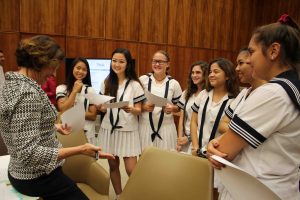 Before the mock trial, students receive guidance from Assistant Federal Public Defender Shanlyn Park, who is also an Academy alumna.