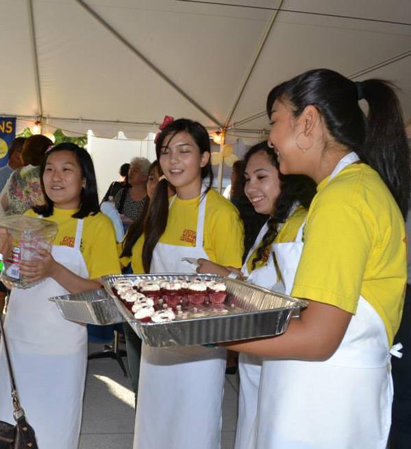 Academy Leo club members helped the Kamehameha Lions Club at their comedy fundraiser on Aug. 24.  Former Leo club members, including Joy Moriguchi, Shaynalynn Ah Sam and Mai Shiomi, also participated as members of the Lions club.