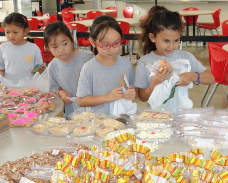 Lower school students purchased healthy snacks at one of last years AUW fundraisers.  