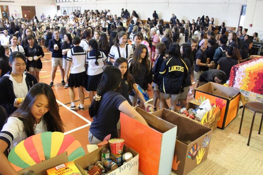 Students donated more than 2,000 canned goods in the annual food drive.