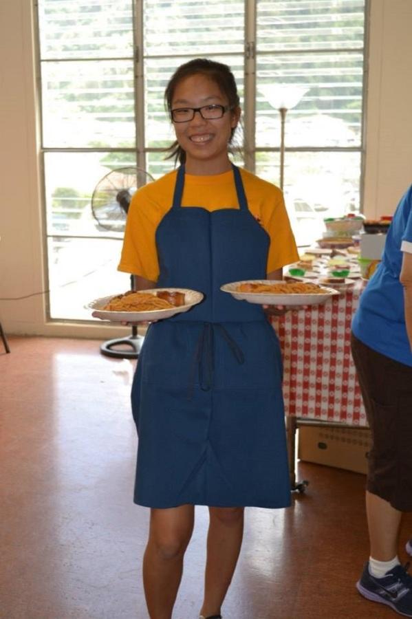 LEO club member Alyssa Kwan volunteers at the Kamehameha Lions Clubs spaghetti fundraiser.