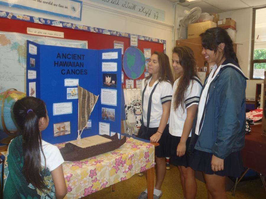 Fourth graders displayed Hawaiian studies projects to other lower school classes and high school visitors.