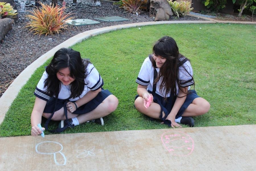 Seniors and sophomores, Big Sisters and Little Sisters, decorated the main walkway with images of Easter. 