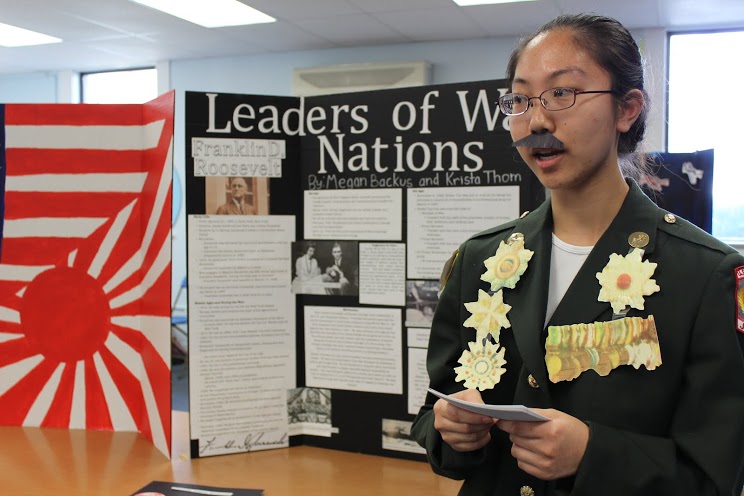 Freshmen in World History classes presented the World Wars Wax Museum while posing as historic figures from the time periods.