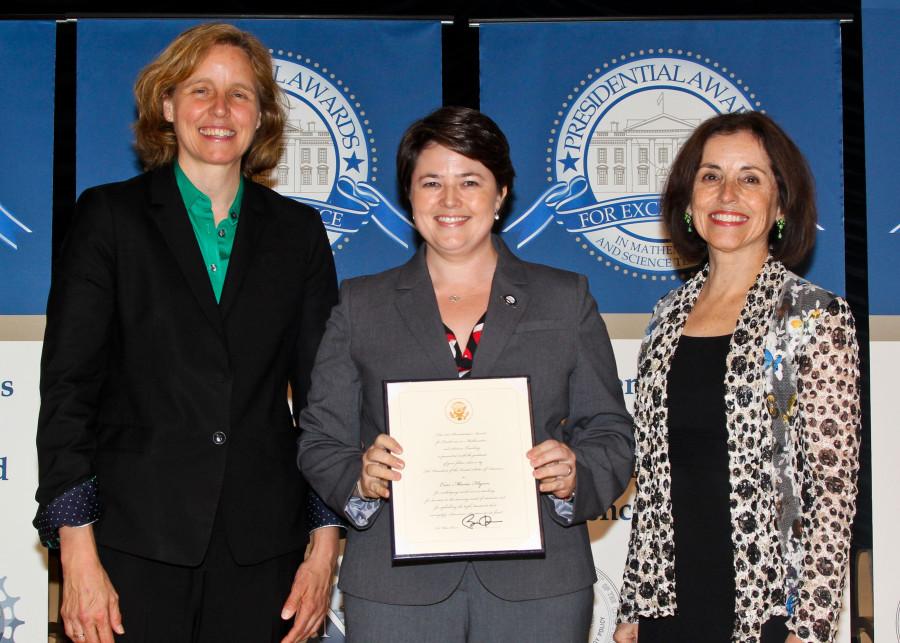 Erin Flynn holding the Presidential certificate flanked by Megan Smith, U.S. Chief Technology Officer and Director of the National Science Foundation, and Dr. France A. Còrdova.

Photo credit: Presidential Awards for Excellence in Mathematics and Science Teaching (PAEMST)