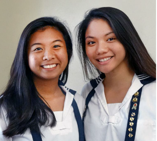 Pakalana Kam (right) and Kaycee Selga will continue to meet with the SAC throughout the school year to discuss issues in school and state athletics.

Photo credit: Alison Miyata