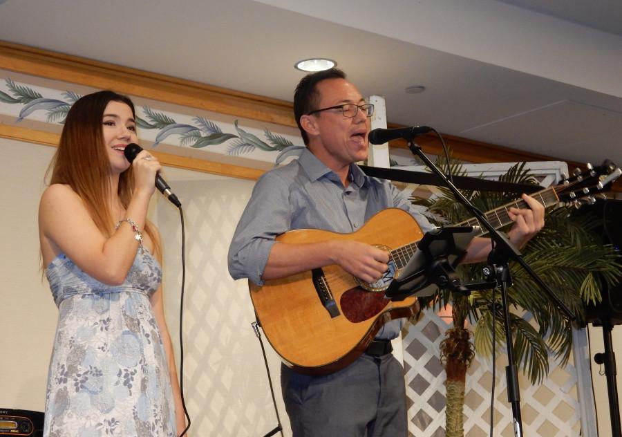 Senior Maya Waldrep performs with her father at the annual Senior Class Ohana Luncheon which celebrates parents and families who have supported students through the years. The occasion marks a last formal gathering of families and friends and classmates before graduation in May.

Photo courtesy of Janelle Medrano