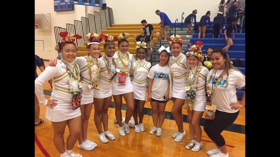The Academy’s JV cheerleaders celebrate after getting first place in the first ILH cheer competition of the year earlier this month. Photo Courtesy- Augie T