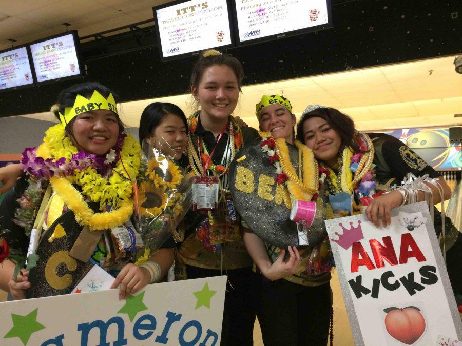 Senior Marissa Okamoto (center) celebrates with teammates last season. Photo courtesy of Marissa Okamoto.