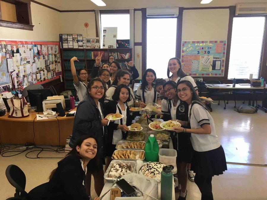 Literature of Food students enjoy a potluck, as a way for food to bring a sense of unity within each other. 