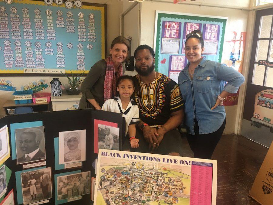  The Bennett Family celebrates the end of Black History Month with Sacred Hearts Academy first graders. Photo courtesy of Laurel Oshiro.