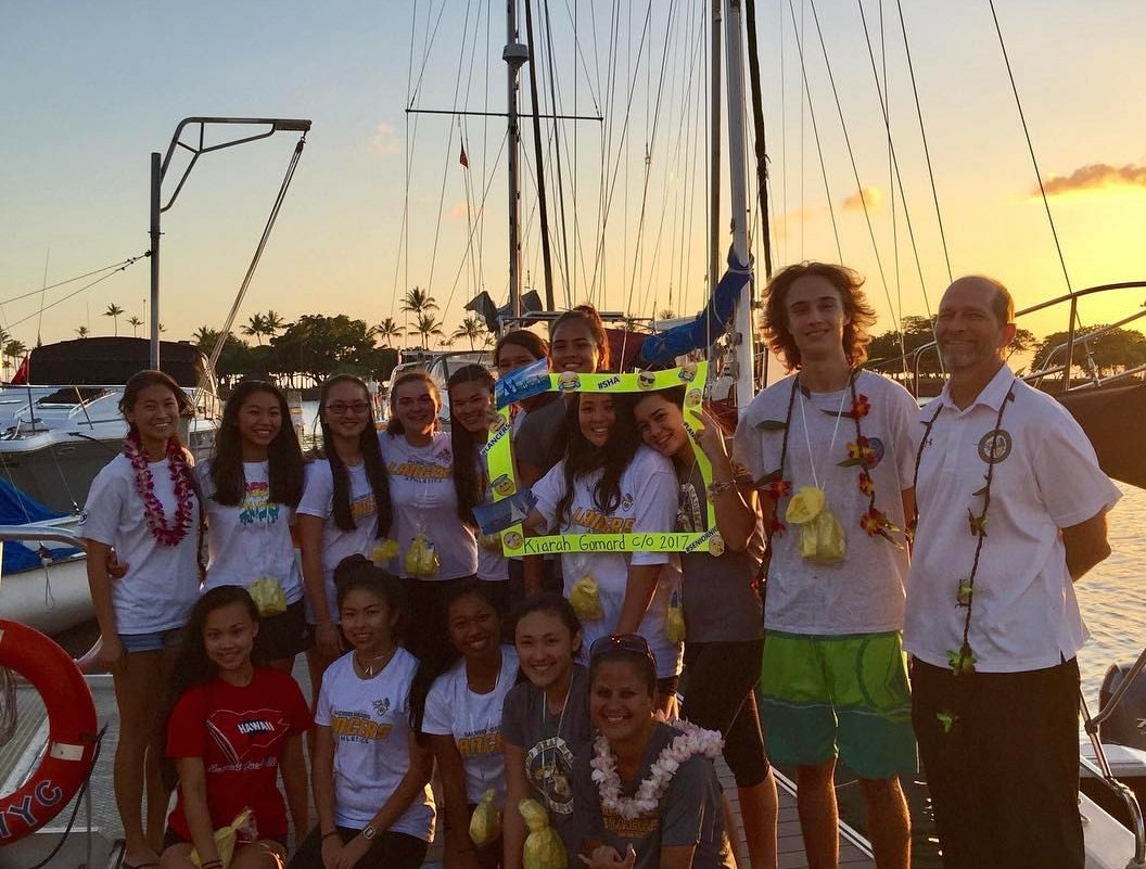 The Academy varsity II and III sailing team celebrating with senior Kiarah Gomard. Photo courtesy of Ailana Warren.