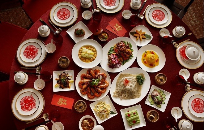 Some popular dishes in a Chinese New Year dinner include rice cakes, turnip cakes, dumplings and various seafood dishes. Photo courtesy of Weijiang.