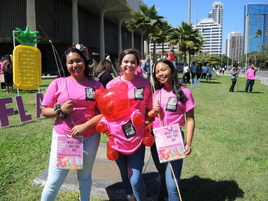 (Left to right) Academy students Dilbul Floyd, Agnes Brown and Jessica Medrano advocated against flavored tobacco products with colorful signage and art at the Hawaii State Capitol. They are part of the Coalition for a Tobacco Free Hawaii (CTFH)’s youth council, which helped introduce bills proposing a ban on such products. Photo courtesy of Agnes Brown.