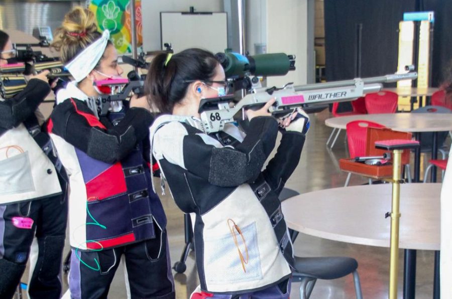 Academy junior and daughter Ariana Sun at a riflery match against Pac-Five this year. She is one of the teams top shooters. Photo courtesy of the Lancer Air Riflery Team.