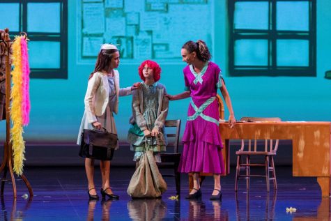 (Left to right) Academy students Cocomi Mehring, Isabella Johnson and Reagan Beissel together on stage for the Academy’s first fall production since the pandemic, “Annie, Jr.” All photos courtesy of Steve Tagupa.
