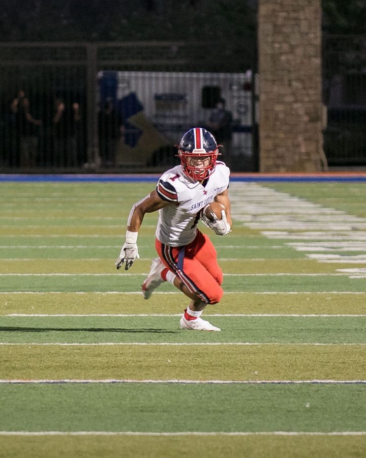 SLS receiver Jaysen Peters DeLaura making a play against Bishop Gorman earlier this year. DeLaura missed the “Friday Night Lights” feeling when he was injured. Photo courtesy of DeLaura.