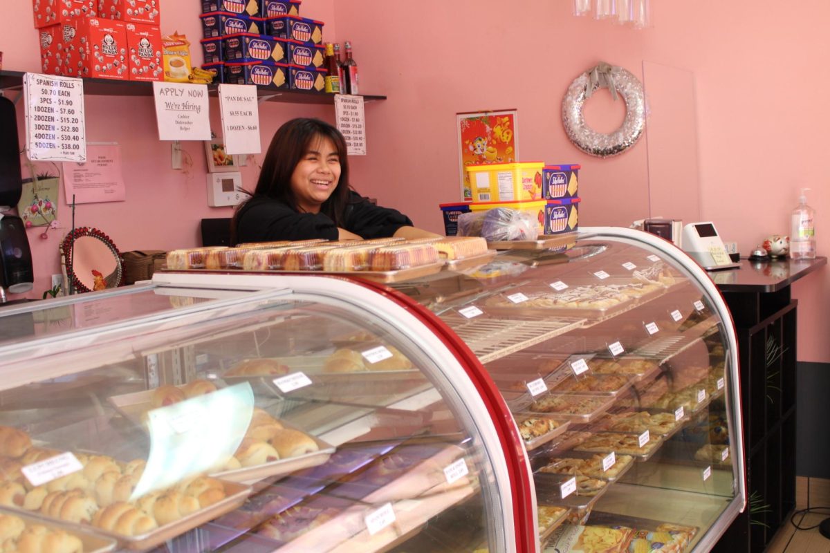 Cassandra Morete greeting customers at the Nanding’s Bakery Kapahulu location. The Academy sophomore has been working at the family business for the past eight years. Photo by Keira Wheeler.