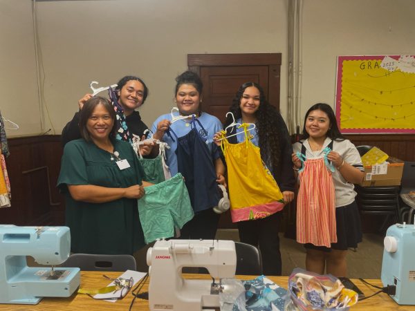 Left to right: Sewing Club advisor Mrs. Asuncion-Tagupa, Ofa Tuiafitu '25, Jacrene Engichy '25, Cayeelah Semisi-Hunkin '25, and Shaylyn Dela Cruz '25 showing off dresses they made in the club. 