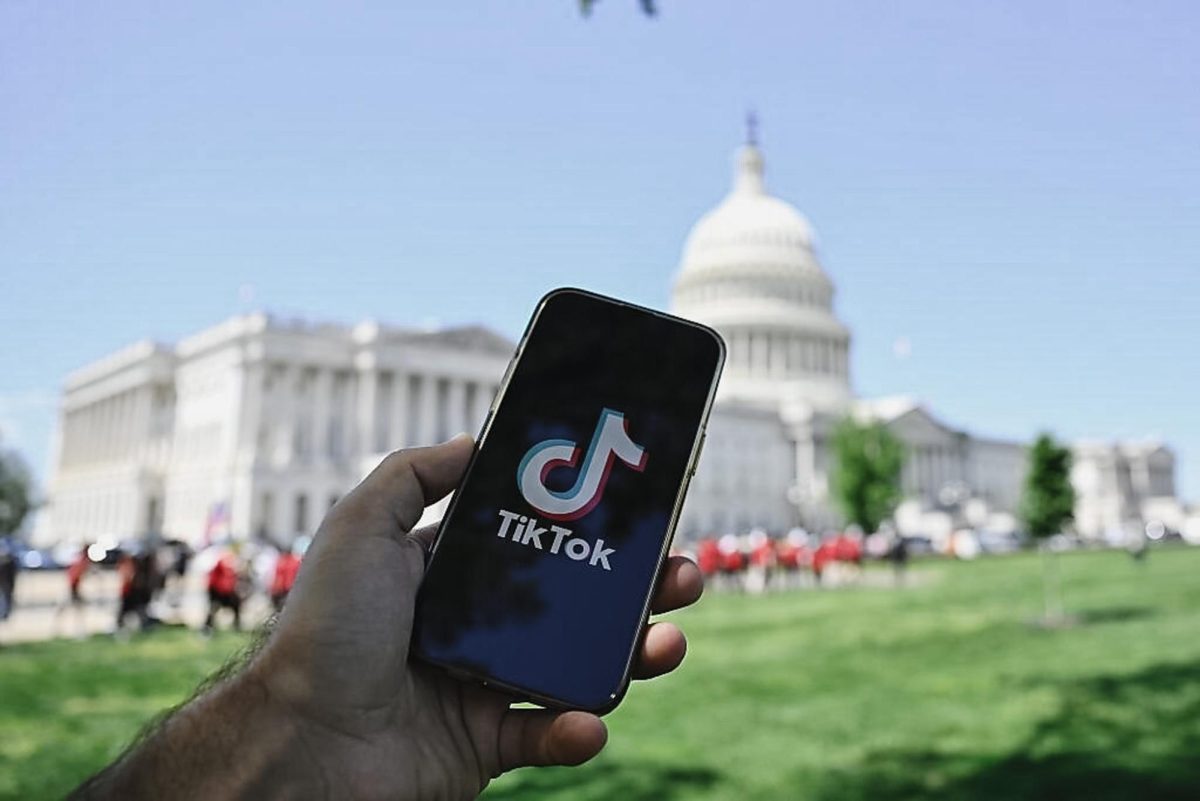 A phone displaying the app TikTok in front of the Capitol. The platform was temporarily banned for 12 hours before resuming operations. Photo courtesy of the Cato Institute.