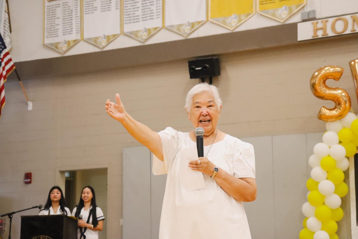 Earlier this year, Sister Katherine Francis Miller took center stage at Sacred Hearts Academy’s 115th birthday celebration, sharing heartfelt stories of her time as a Lancer with students, teachers and alumnae. She has been a devoted member of the Congregation of the Sacred Hearts of Jesus and Mary for over 50 years, living out its mission to "Contemplate, Live and Proclaim the redeeming love of God revealed in the Hearts of Jesus and Mary." Her dedication to education is evident in her long-standing role at the Academy, where she continues to teach theology, even in retirement. In 2019, she was recognized alongside other jubilarians for her significant contributions to the spiritual and academic community. Miller is known for embodying the spirit of aloha and inspires others to recognize the divine in all aspects of life. Many would agree that her enduring impact is felt by the Academy and all who have had the opportunity to learn from her.