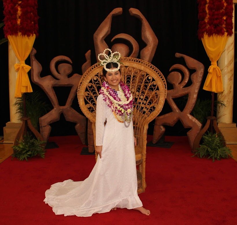 May Day Queen senior Anna Casupang poses for a photo after her performance in the gym. Casupang was elected queen after receiving the majority of the student vote. She danced in front of the middle and upper school a month before May Day, competing against another senior student. Photo courtesy of Thuan Giang