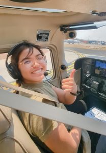 I smile at the camera upon completing my cross country flight from Prescott to Page, AZ. The cross-country flight was one of several flights planned for the participants of Embry-Riddle Aeronautical University’s Take Flight Program this summer. Photo courtesy of Genevieve Leong.