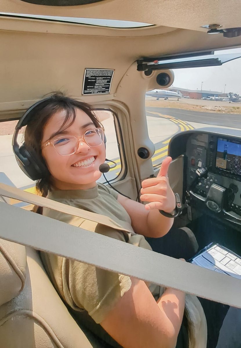 I smile at the camera upon completing my cross country flight from Prescott to Page, AZ. The cross-country flight was one of several flights planned for the participants of Embry-Riddle Aeronautical University’s Take Flight Program this summer. Photo courtesy of Genevieve Leong.