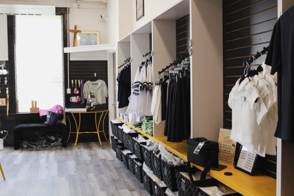 The new Lancer Locker shows a clean organized display of school merchandise. The school store includes plenty of space and is located in an area where everyone can view it.