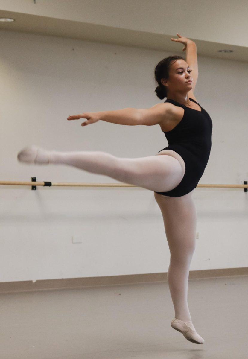 Freshman Kennedy Barton presents an arabesque position.