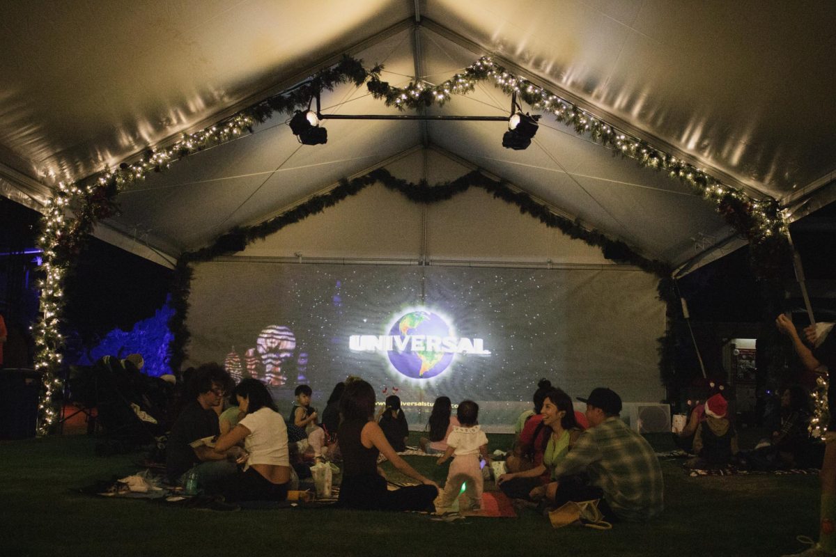 Community members gathered under the movie tent to watch a lineup of holiday films. Feature-length selections included “The Polar Express,” “A Christmas Carol” starring Jim Carrey, “Dr. Seuss’ How the Grinch Stole Christmas,” “Elf,” “Five Star Christmas,” “A Shoe Addict’s Christmas,” “Frozen,” “The Santa Clause,” “Take Me Back for Christmas” and “Frozen II.”
The schedule also featured holiday shorts such as “Duck the Halls: A Mickey Mouse Christmas Special,” “The Smurfs Christmas Special,” “Merry Madagascar,” “Dragons: Gift of the Night Fury,” “Olaf’s Frozen Adventure,” “Kung Fu Panda Holiday,” “Frosty’s Winter Wonderland,” “Rudolph the Red-Nosed Reindeer” and “Mickey’s Christmas Carol.”