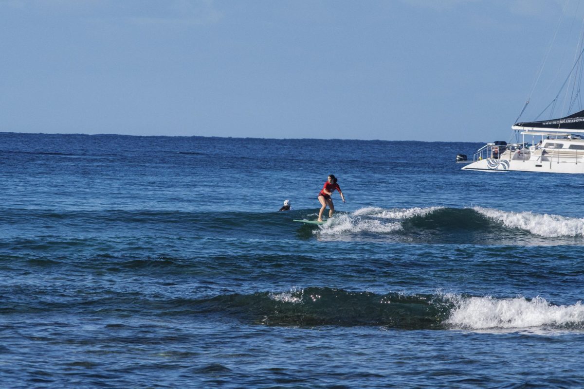 Senior Elora Speltz competes in the girls longboarding division at Rockpiles earlier this month. This was the final contest of the season before a make-up contest at Queen's Beach and the ILH championships at Ala Moana Bowls.
