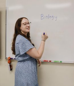 Housman has been a teacher at the Academy for almost a decade. She enjoys kickboxing in her free time. 